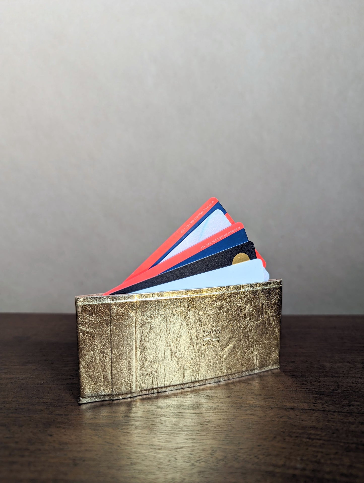 The wallet in gold
